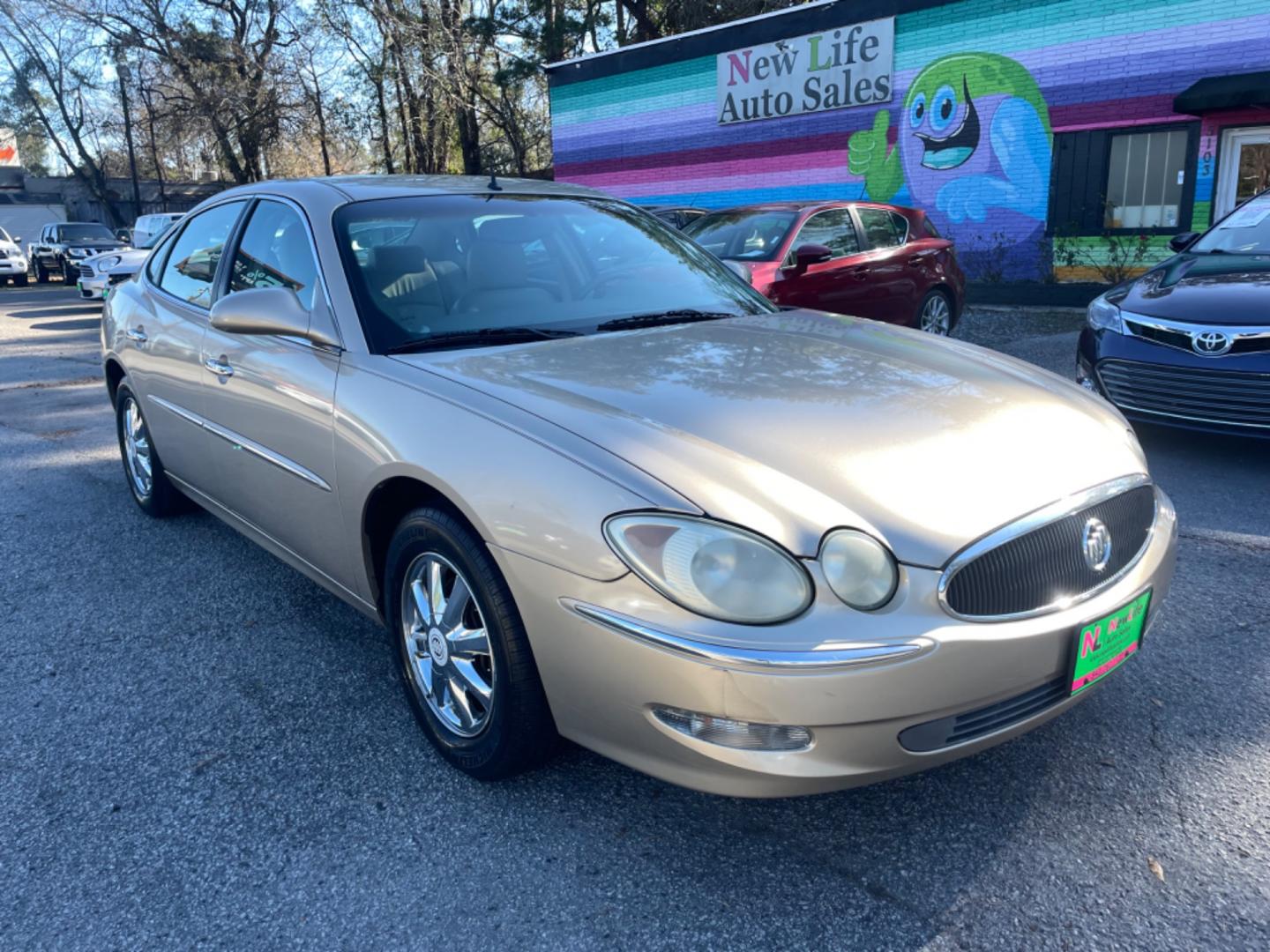 2005 GOLD BUICK LACROSSE CXL (2G4WD562351) with an 3.8L engine, Automatic transmission, located at 5103 Dorchester Rd., Charleston, SC, 29418-5607, (843) 767-1122, 36.245171, -115.228050 - Local Trade-in with Leather, CD/AM/FM, OnStar, Dual Climate Control, Power Everything (windows, locks, seats, mirrors), Keyless Entry, Chrome Wheels. Clean CarFax (no accidents reported!) Only 119k miles! Located at New Life Auto Sales! 2023 WINNER for Post & Courier's Charleston's Choice Pre-owned - Photo#0